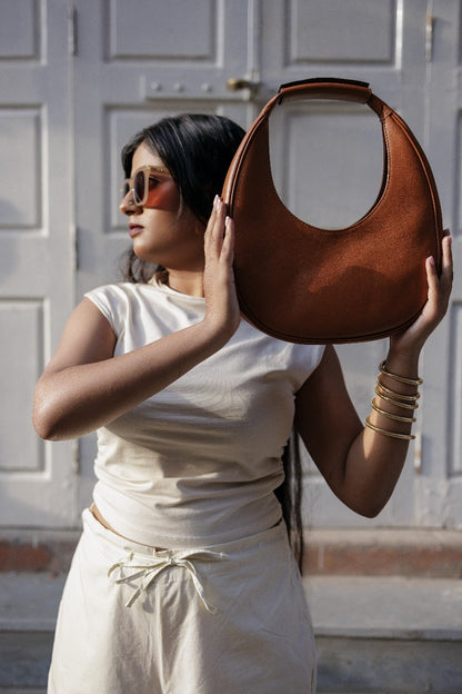 The Solara Crescent Bag - Sculpted In Sunlight