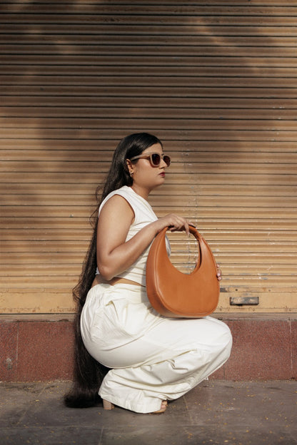 The Solara Crescent Bag - Sculpted In Sunlight
