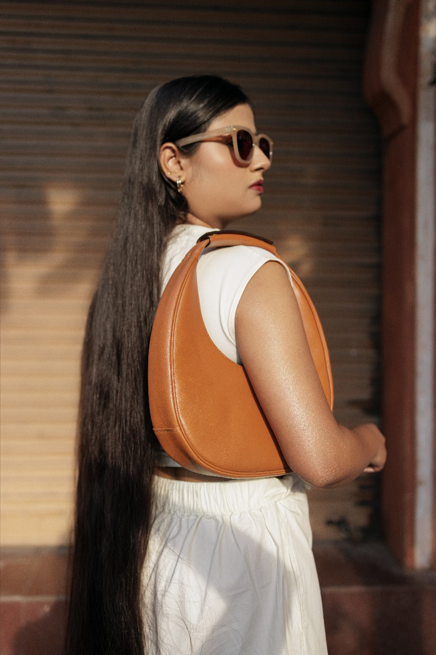 The Solara Crescent Bag - Sculpted In Sunlight